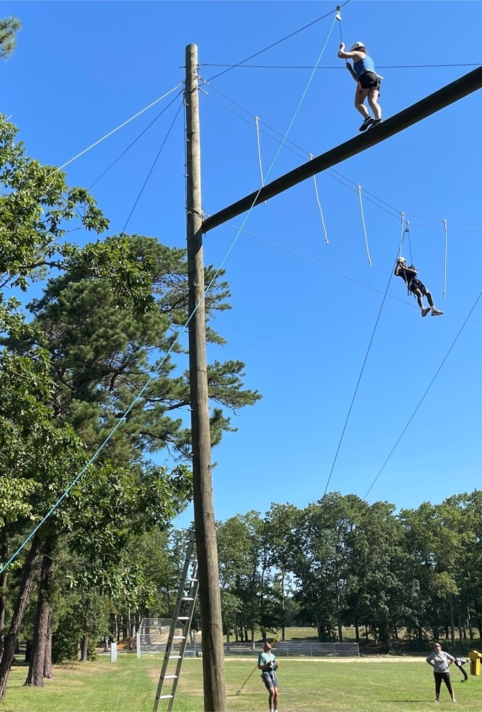 Team building on the ropes course. 