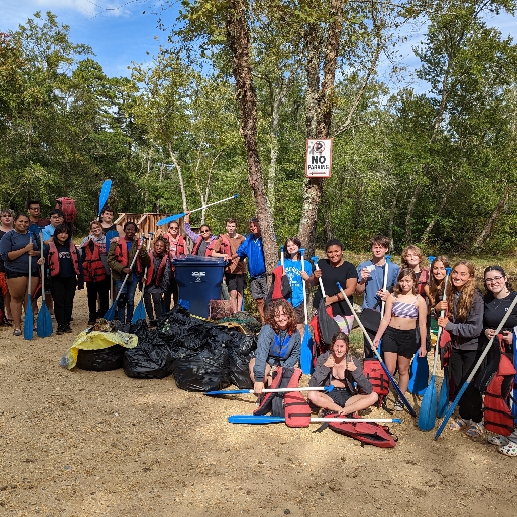 OHS science club with the trash collected along the river