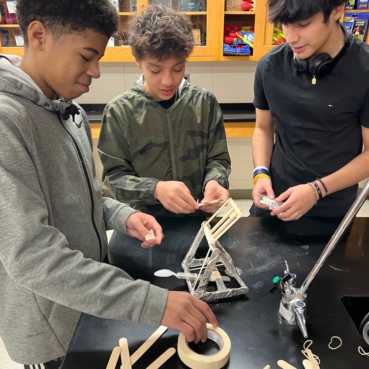 students building catapult 