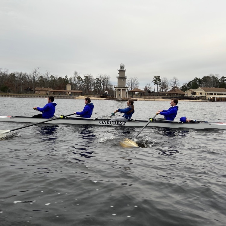 rowing by a lighthouse 